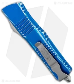 Microtech Combat Troodon D/E OTF Automatic Blue Distressed (3.8" Apocalyptic) -Knife Shop Microtech Combat Troodon DE OTF Auto Blue Distressed SW 142 10DBL BHQ 99299 jr side